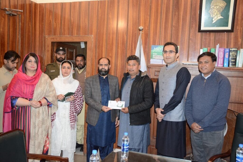 In addition, Mr. Moazzam Rauf Ticket Holder handed over a minority card to a
deserving family.