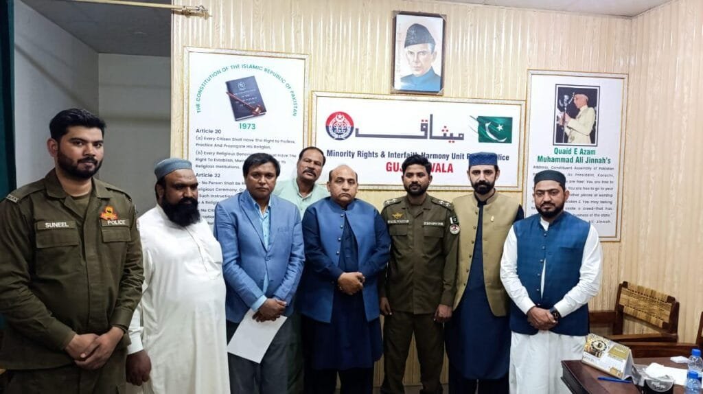 Police officials, Christian Muslim religious leaders, and Peacemakers are during