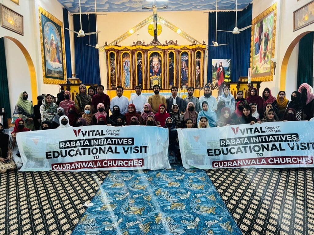 A Group Photo with the Parish Priest, the Assistant Parish Priest, catechists, staff, and students