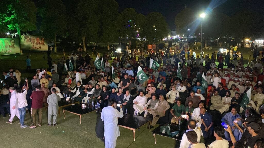 The people held Pakistani flags and banners